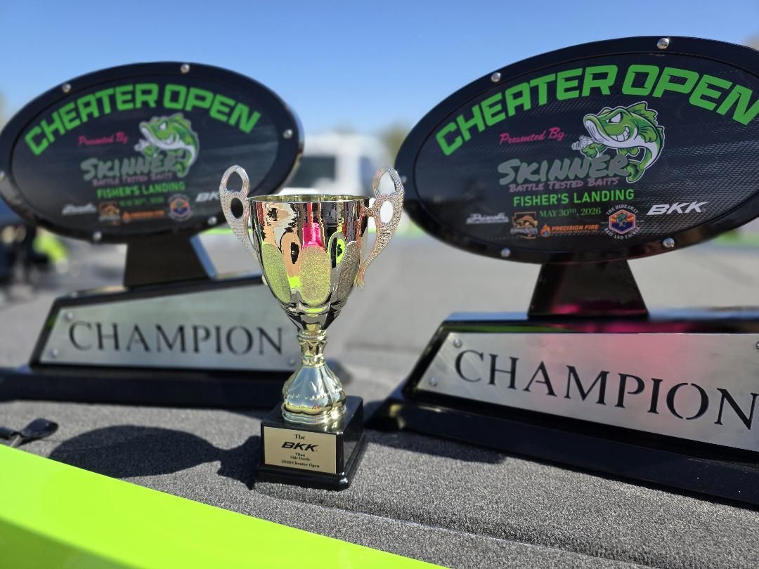 The champion plaques and BKK cup on the front of a boat